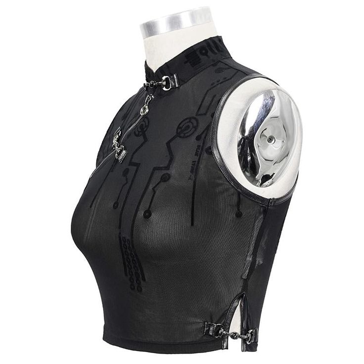 a black mesh sleeveless crop top with a zipper and chain detailing. the top has a mock collar and is styled on a mannequin.  it features a black velvet trim.