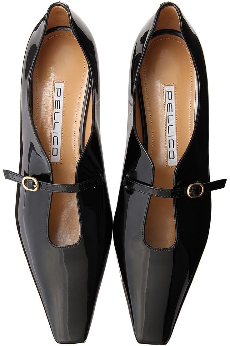a pair of black patent leather pellico shoes with a pointed toe and tstrap are shown against a white background.  the shoes are elegantly designed and appear to be made of highquality materials.  the pellico brand label is visible inside each shoe.