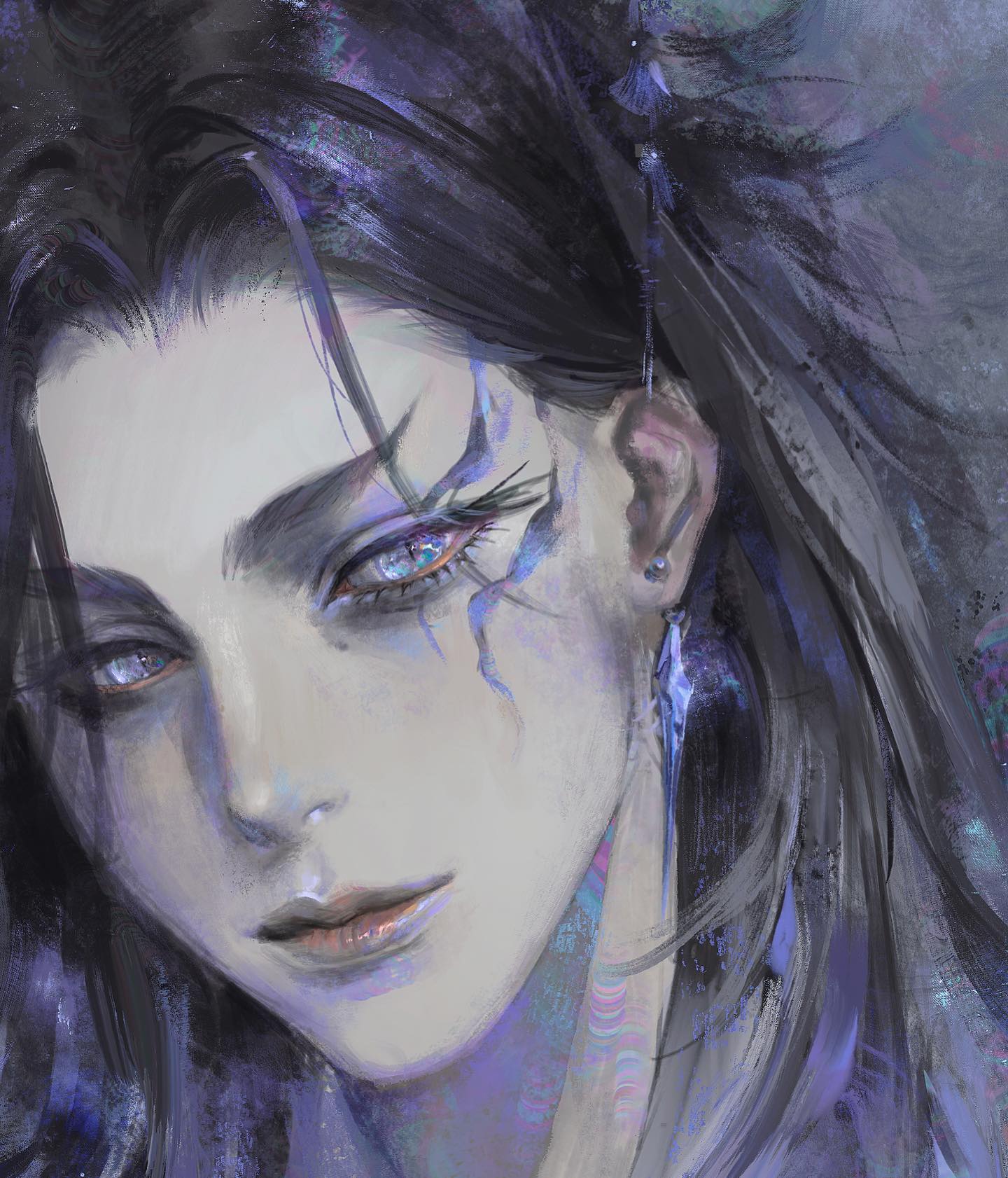 the image shows a closeup of a young man. he has long, dark hair with a braid on the side, and he is wearing jewelry in his ear. the man has striking blue eyes and a tattoo or marking on the side of his face. the overall color scheme of the image is cooltoned, with shades of blue and purple dominating. the lighting is soft and diffused, giving the subject a dreamy or ethereal quality. the man's expression is neutral but captivating, with a hint of a smirk on his lips.