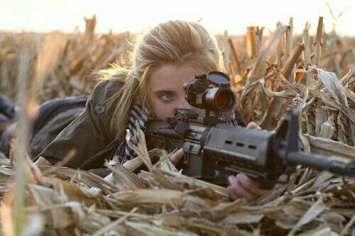 a woman soldier camoufla
