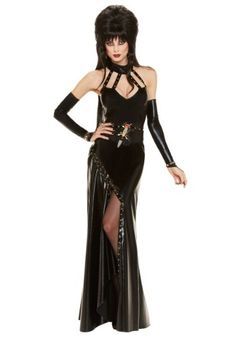 the image shows a woman dressed as morticia addams from the addams family. she is wearing a long, black, formfitting gown with a halter neckline, a long black cape, black gloves, and a black wig with a widow's peak. she has a pale complexion and dark, dramatic makeup. the dress is very revealing, but it is still elegant and stylish. she appears to be a spooky and scary character, but also very sexy and alluring.