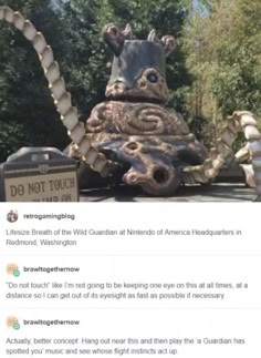 an image of a lifesize statue of a guardian from the legend of zelda: breath of the wild at the nintendo of america headquarters in redmond, washington. the statue is made of a brown, rough material, with the signature red eye of the guardian.  the image has text on the bottom that states that this statue is "do not touch" and that the poster is going to keep one eye on it so they can get out of its sight as fast as possible if necessary.  the final text mentions a funny idea to hang out near the statue and play the "guardian has spotted you" music and see who gets scared.