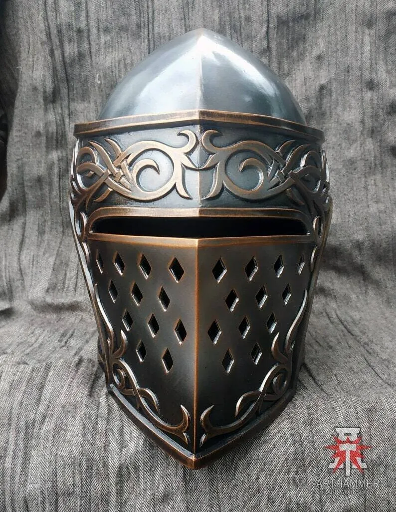 a closeup image showcasing a meticulously crafted medievalstyle helmet. the helmet is made of metal with a dark, almost gunmetal grey finish, accented by gleaming bronze or coppertoned trim and detailing. intricate, swirling patterns reminiscent of celtic knotwork adorn the brow and lower portion of the helmet. the faceplate features a series of diamondshaped cutouts for ventilation and visibility.  the helmet is positioned directly facing the viewer against a textured, dark grey backdrop.  the lighting is soft and highlights the helmet's craftsmanship and metallic sheen.