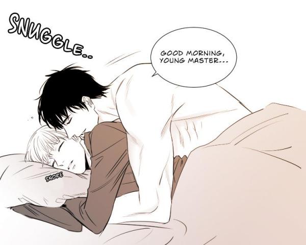 the image is a panel from a boys' love (bl) manga or manhwa. it depicts two young men in bed together. one, with darker hair, is awake and is gently cuddling the other, who is asleep and has lighter hair. the darkerhaired man is leaning down, his face close to the sleeping man's.  the scene is intimate and suggestive of a romantic relationship.  there is speech bubble text that says "good morning, young master..." from the awake man, and "snuggle..." and "snore" are written as onomatopoeia effects near the couple. the overall style is soft and romantic, typical of the genre.