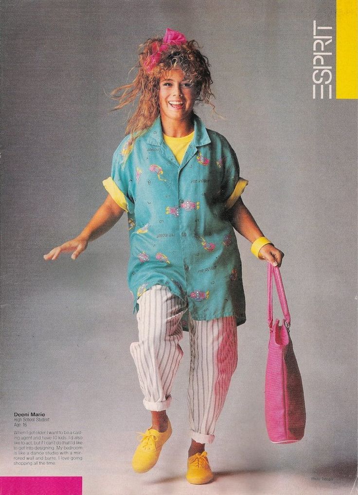 a vintage advertisement from the 1980s for esprit clothing featuring a teenage girl named deoni mario. she is smiling and posed as if in midair, wearing a turquoise collared shirt with colorful fish patterns, a yellow tshirt underneath, striped pants with alternating white and pink stripes, and yellow tennis shoes. she has a large pink bow in her curly, teased hair, a yellow bracelet, and is carrying a pink handbag. the esprit logo is displayed prominently. the overall style is bright, colorful, and indicative of the 1980s fashion trends. text describing deoni is present in the lower left corner.
