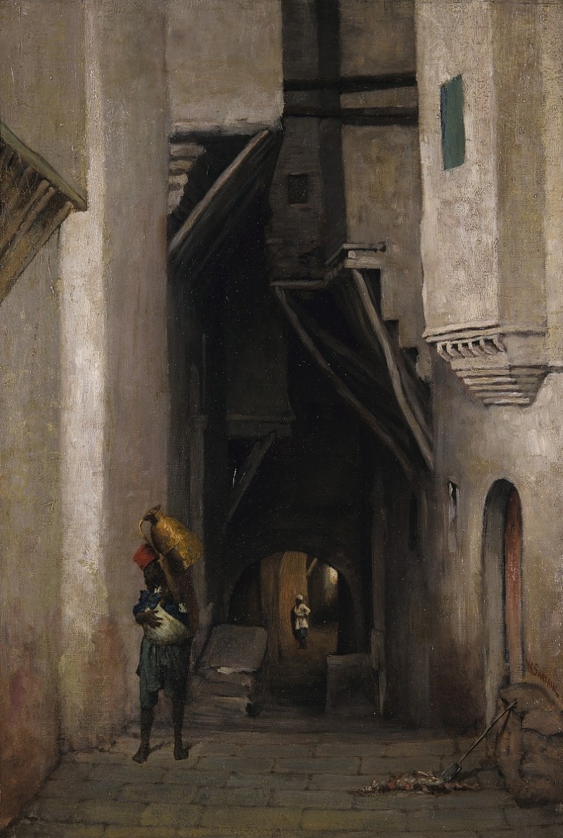 this is a painting of a dark alleyway in what appears to be a middle eastern or north african city. the buildings are old and made of stone or brick, with intricate details and balconies. a man is carrying a large jug on his head, walking towards the foreground. in the background, another person is visible under an archway. there is a cart and dirt on the ground. the overall tone of the painting is dark and mysterious, with a strong emphasis on shadows.