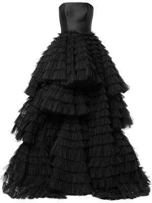 this is a black strapless gown with ruffles made of tulle. it is a formal dress, appropriate for a wedding, prom, or other special event.
