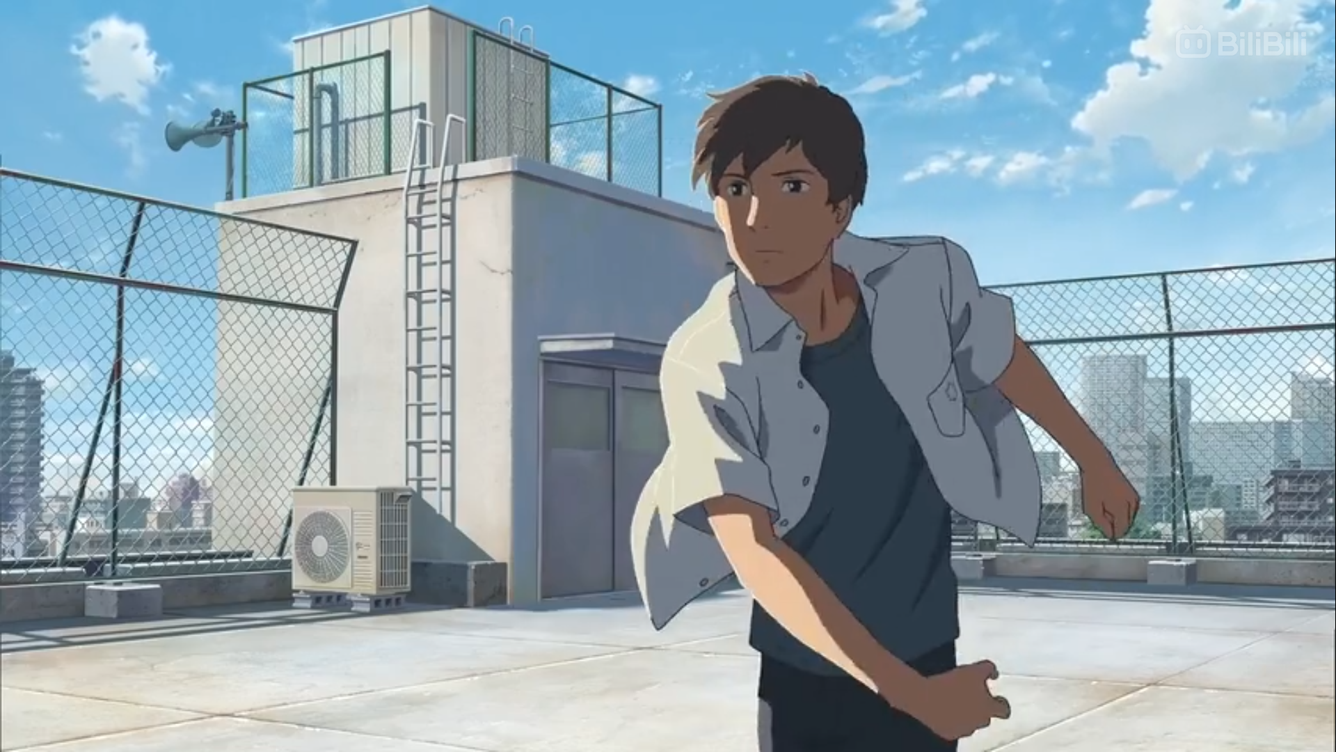 a young man with brown hair and wearing a white shortsleeved shirt and black pants is standing on a rooftop in a city. he is looking to the left and his arms are outstretched. the rooftop is surrounded by a chainlink fence and there is a water tower and an air conditioner unit on the roof. the sky is blue with some clouds. the drawing style is anime.