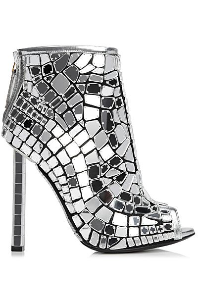 the image shows a pair of women's silver ankle boots with a high stiletto heel. the boots are covered in a mosaic of small mirror pieces, creating a sparkly, reflective surface. the design is peeptoe and features a unique mirrored heel.  the boots are positioned on a white background.