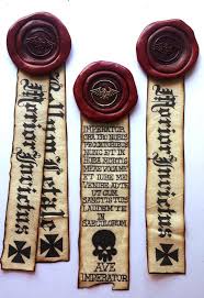three weathered ribbons with latin text and the symbol of the dark angels space marine chapter from warhammer 40k. each ribbon is adorned with a wax seal bearing the same symbol. the text appears to be an oath or dedication to the chapter's mysterious founder, the lion el'jonson, referred to as "imperator."