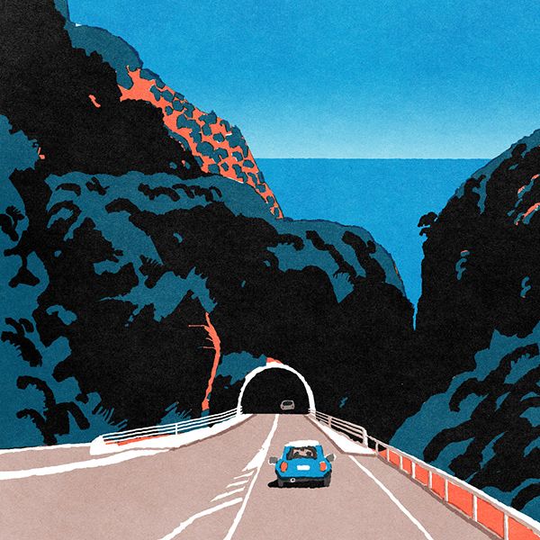 the image shows a picturesque seaside road scene. a single blue car is driving towards a tunnel cut through a mountain, with the bright blue ocean visible in the distance. the scene is bathed in warm sunlight, suggesting a beautiful summer day. lush vegetation covers the slopes of the mountains. a guardrail lines the right side of the road, adding a sense of safety and guiding the viewer's eye towards the vanishing point inside the tunnel.