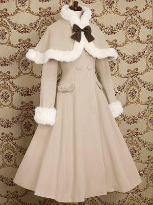 a longsleeved, aline lolitastyle dress coat with large faux fur trim on the collar, cuffs, and bottom of the cape. the coat is beige. a large brown bow is tied at the neck. the coat has large buttons down the bodice. the coat is on a mannequin against a patterned background.