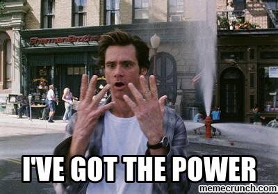 a meme featuring jim carrey from the movie bruce almighty. he has a surprised expression with his hands raised, standing in front of a fire hydrant that is gushing water. the text overlay reads "i've got the power" and "memecrunch.com" is at the bottom. the background includes buildings and people on the street.