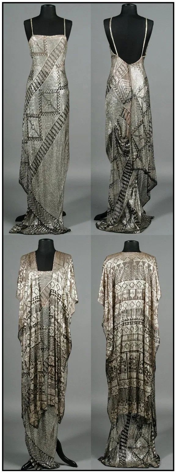 a collage shows four images of a silver dress and shawl with black patterns, displayed on mannequins. the upper left and right images feature a sleeveless, floorlength gown with thin straps. the front of the dress has geometric patterns and diagonal lines, while the back shows a low back design. the lower left and right images showcase a shawl with matching silver and black patterns, draped over a dress on a mannequin. the shawl has a loose, flowing design and complements the overall aesthetic. the background is a solid gray.