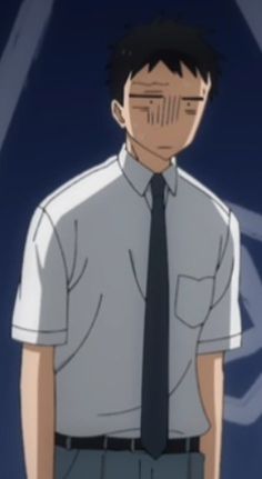 the image depicts a young man with short black hair and brown eyes. he is wearing a white shortsleeved buttonup shirt, a dark blue tie, and gray pants. he is blushing, with vertical blush lines on his cheeks, and his eyes are averted and narrowed in an expression of embarrassment or discomfort.  the background is a dark blue with some lighter blue shapes, possibly suggesting a wall or interior space.
