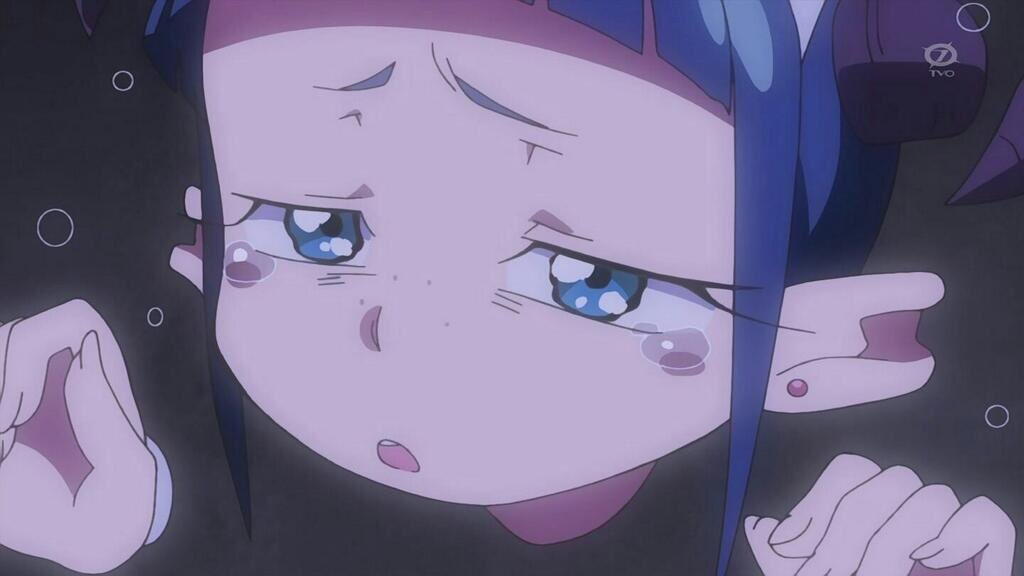 a young, anime girl is depicted crying with a sad expression on her face. the style is cartoonlike, and the lighting is dimly lit, creating a melancholic mood. tears can be seen welling up in her large, blue eyes.