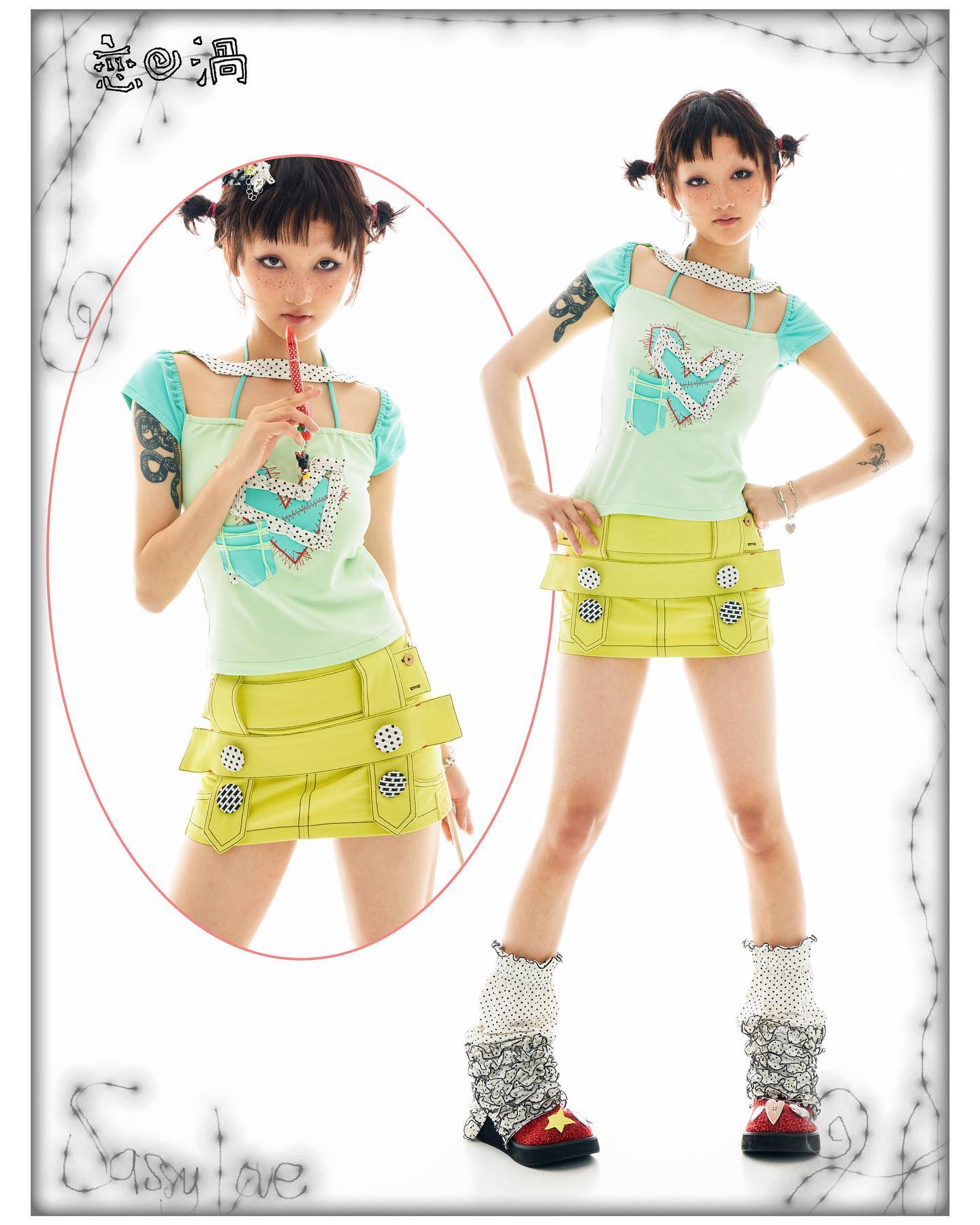 the image features two fullbody shots of a young asian model showcasing a vibrant and playful outfit, typical of harajuku or kawaii fashion. the outfit consists of a pastel mint green, offtheshoulder crop top with a cute heartshaped design and a bright yellow miniskirt with multiple layers and studded detailing. the model is wearing white and grey ruffled leg warmers that end in red shoes with star accents. she has pigtails, subtle makeup, and tattoos on her arms. the image is presented on a background with delicate decorative elements and the words "sassy love" and japanese characters are included. the overall aesthetic is cute, quirky, and trendy, reflecting elements of multiple substyles within japanese fashion.