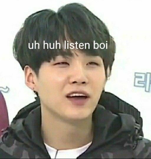 the image is a meme featuring a closeup shot of a man, presumably suga from bts, with the text "uh huh listen boi" overlaid on the image. the man's expression is one of amusement or disbelief. he is wearing a darkcolored jacket and has black hair. the background is a blurred white.