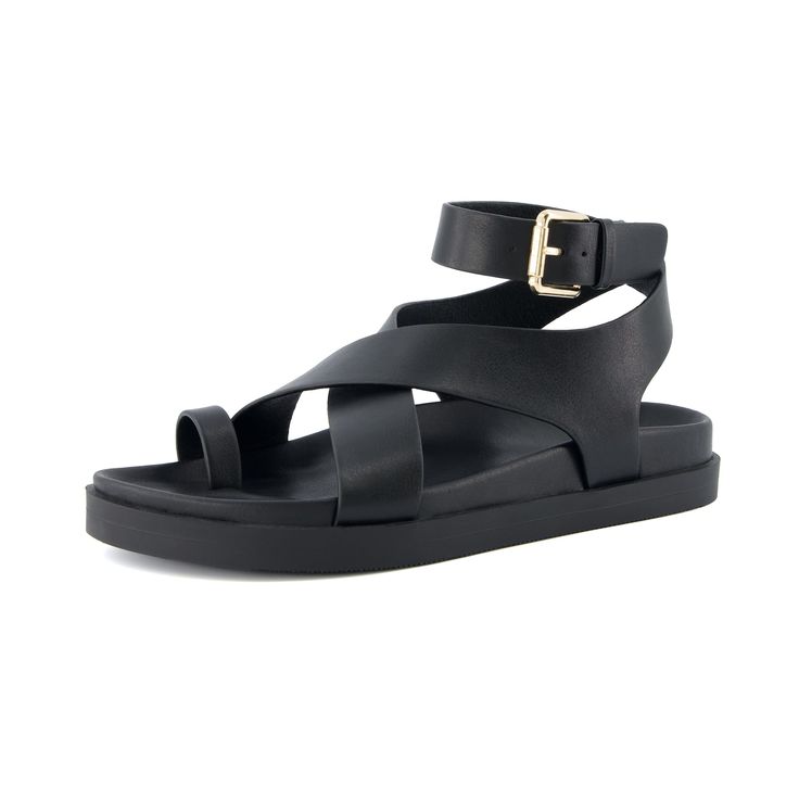 the image shows a black leather sandal with a flat sole. it has a toe loop and cross straps across the foot, along with an ankle strap with a goldcolored buckle.