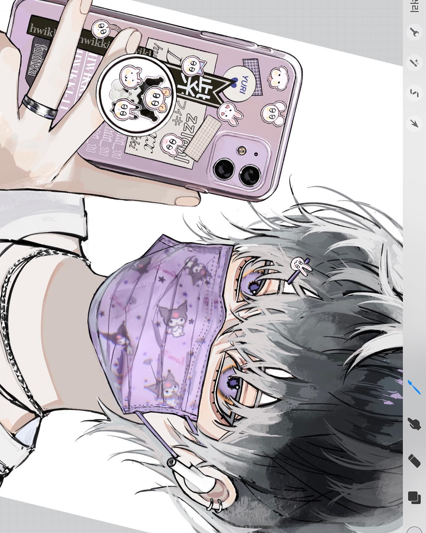 the image is a detailed digital illustration or fanart in an anime/manga style. it features a closeup view of a young person with grey hair, wearing a pastel purple face mask adorned with cartoonish characters, and glasses with purple accents.  they're holding a smartphone with a decorated case; the case is also predominantly purple and decorated with various stickers and designs, in a kawaii style.  the overall aesthetic is a blend of pastel goth and cute, with detailed accessories including rings and earrings visible. the art style is smooth and stylized.  the background is a light grey, focusing the viewer's attention on the character and their phone.