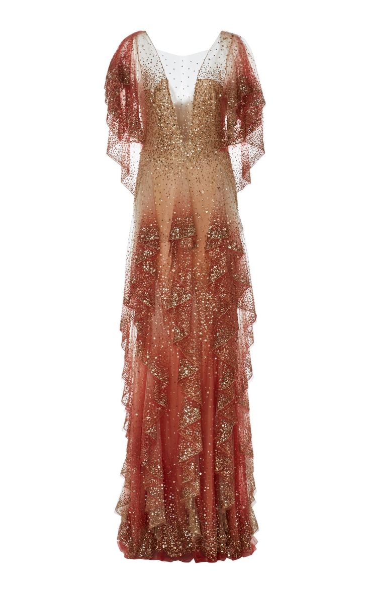 a long, elegant gown with a vneck and short, ruffled sleeves. the dress is made of a sheer fabric with an ombre effect, transitioning from gold and peach at the top to a deeper shade of orange at the bottom. the gown is heavily embellished with sequins, adding sparkle and texture throughout, especially on the ruffled tiers of the skirt.