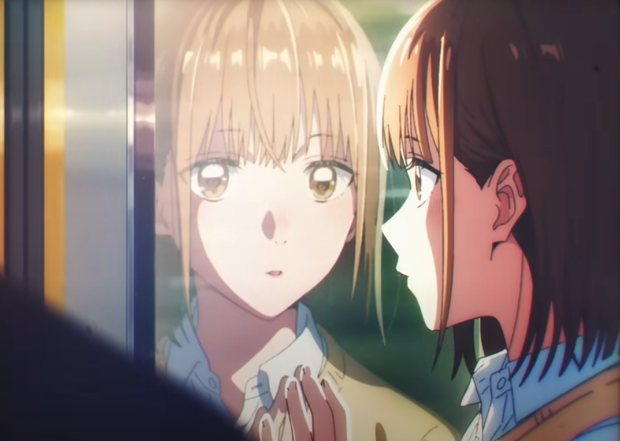 he image shows a closeup view of two anime girls. one girl is seen in a reflection on a glass window, possibly a train or bus window.  the reflection shows a blondehaired girl with a somewhat pensive expression.  the other girl, with brown hair, is looking at the reflection with a thoughtful, almost wistful expression. the scene conveys a sense of intimacy and emotional depth. the style is consistent with modern anime aesthetics.