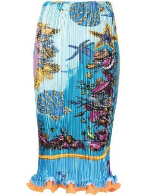 a blue pleated midi skirt with a marine life print of seashells and starfish. the skirt has an orange trim at the bottom.