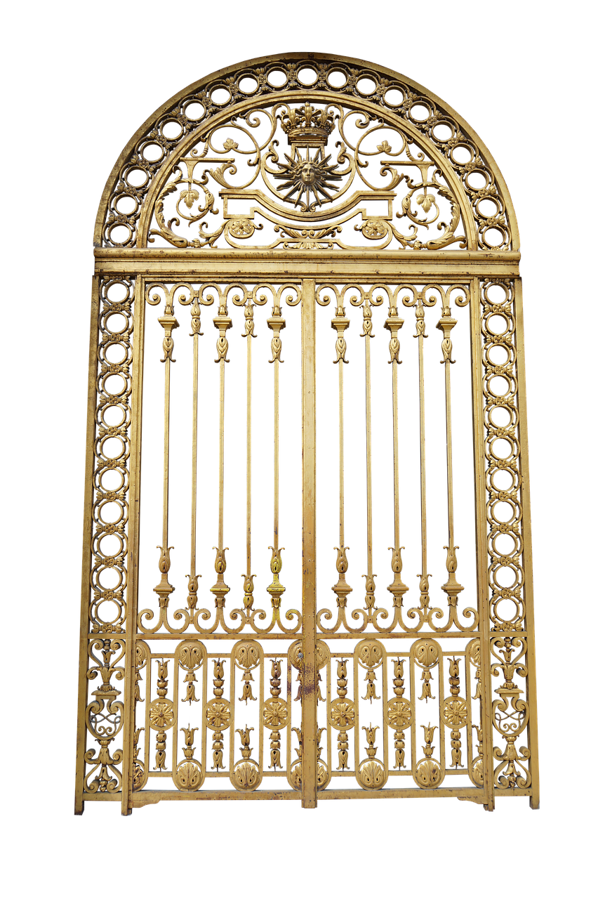 a golden, ornate wrought iron gate is centered against a black background. the gate is arched at the top and features intricate metalwork designs. at the top center is a crown atop a sunburst emblem. the gate has vertical bars and decorative elements along the sides and bottom.
