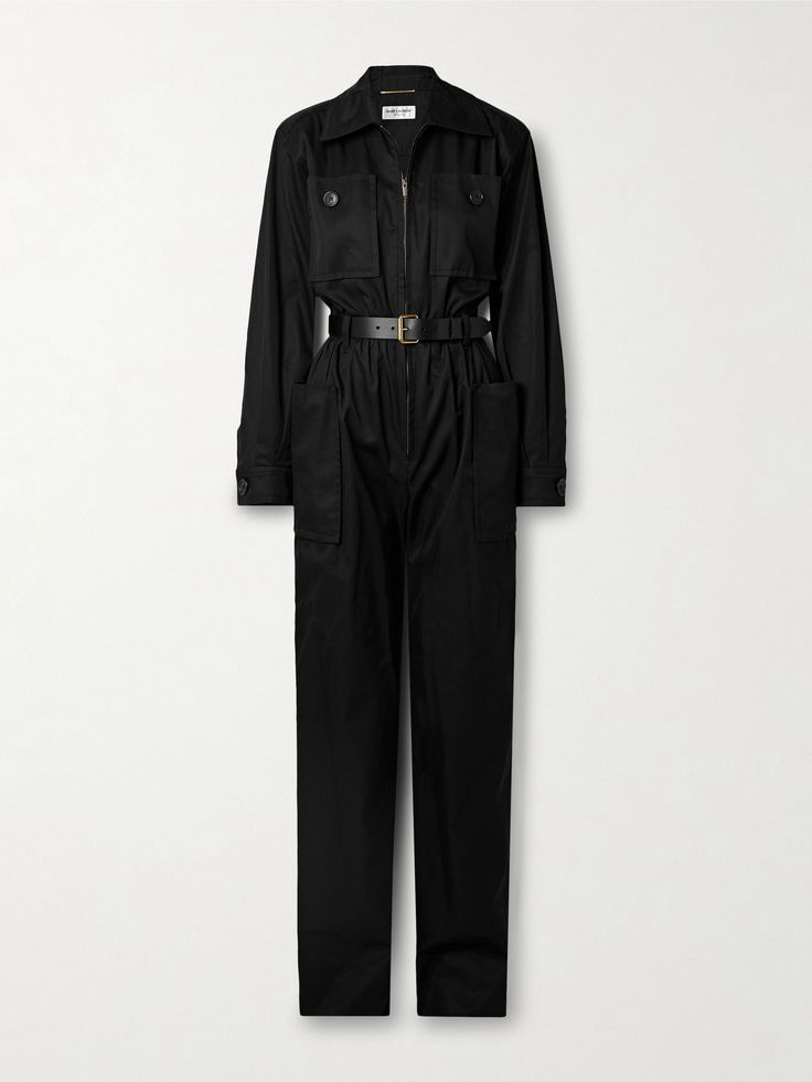 a black long sleeve jumpsuit with a belt. the jumpsuit has pockets on the front and back. it is a women's fashion item.