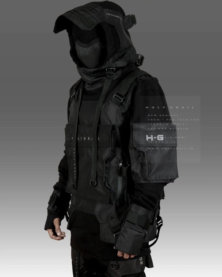 a person wearing all black tactical gear and a hooded jacket with a mask. the outfit is designed in a futuristic style, with straps and pockets. the person is standing in front of a grey background.