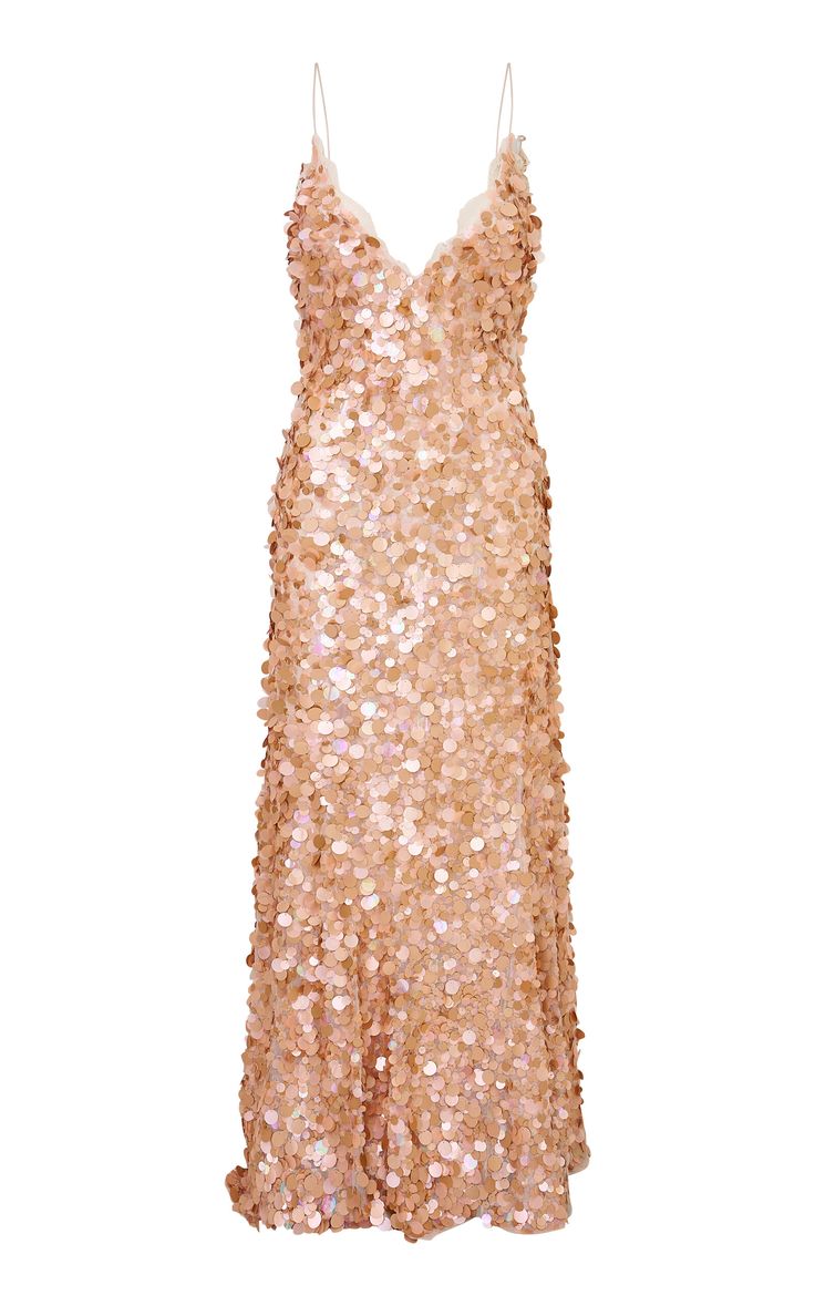 a rose gold sequin spaghetti strap dress with a vneck and midi length.