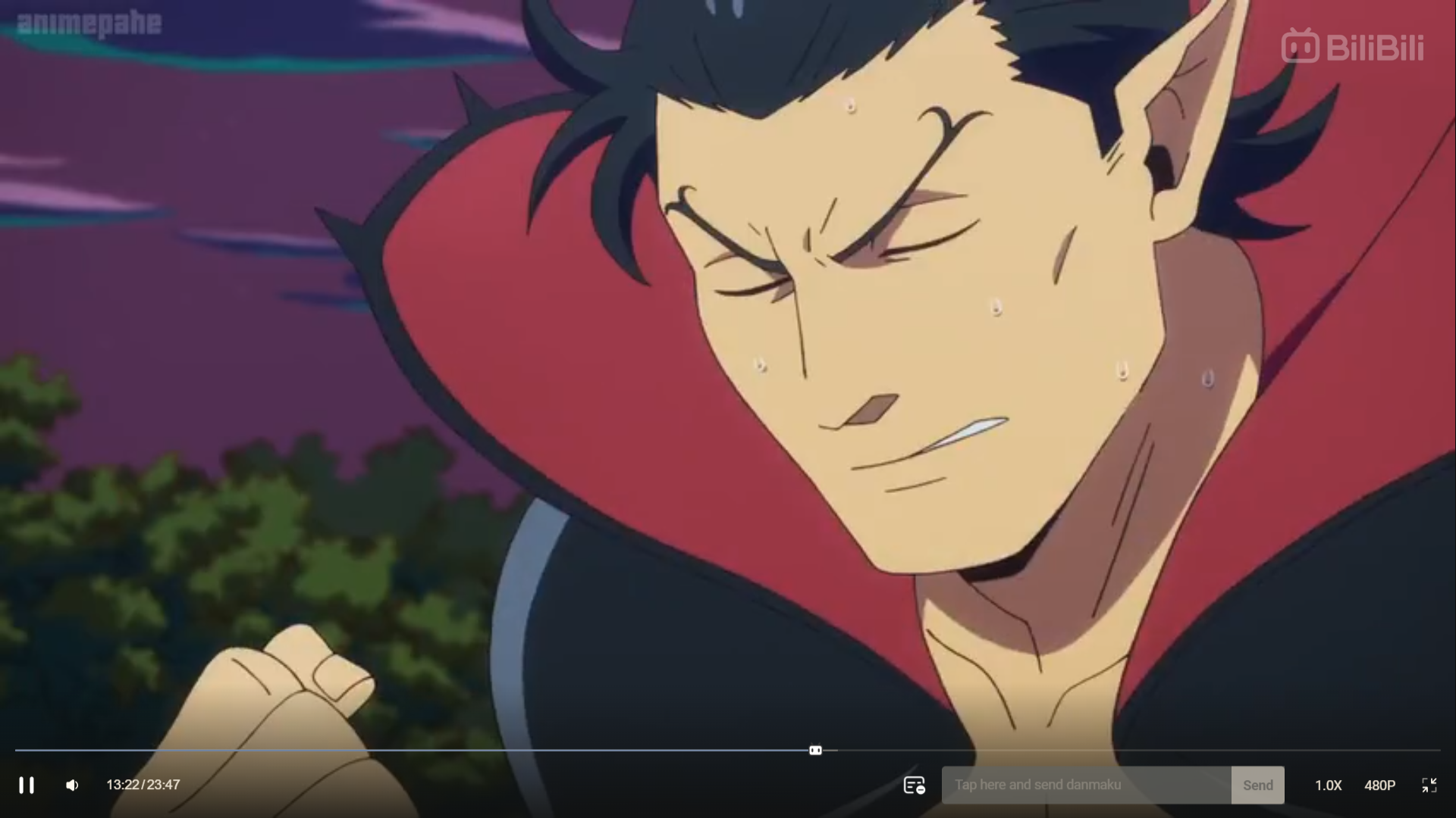 a closeup screenshot of a male anime character with dark hair and pointed ears, suggesting he's a vampire. he wears a black and red collared outfit. he's sweating and his expression is focused and determined, suggesting he's in a tense situation. the background is a blurry, dark forest at night, further emphasizing the drama.