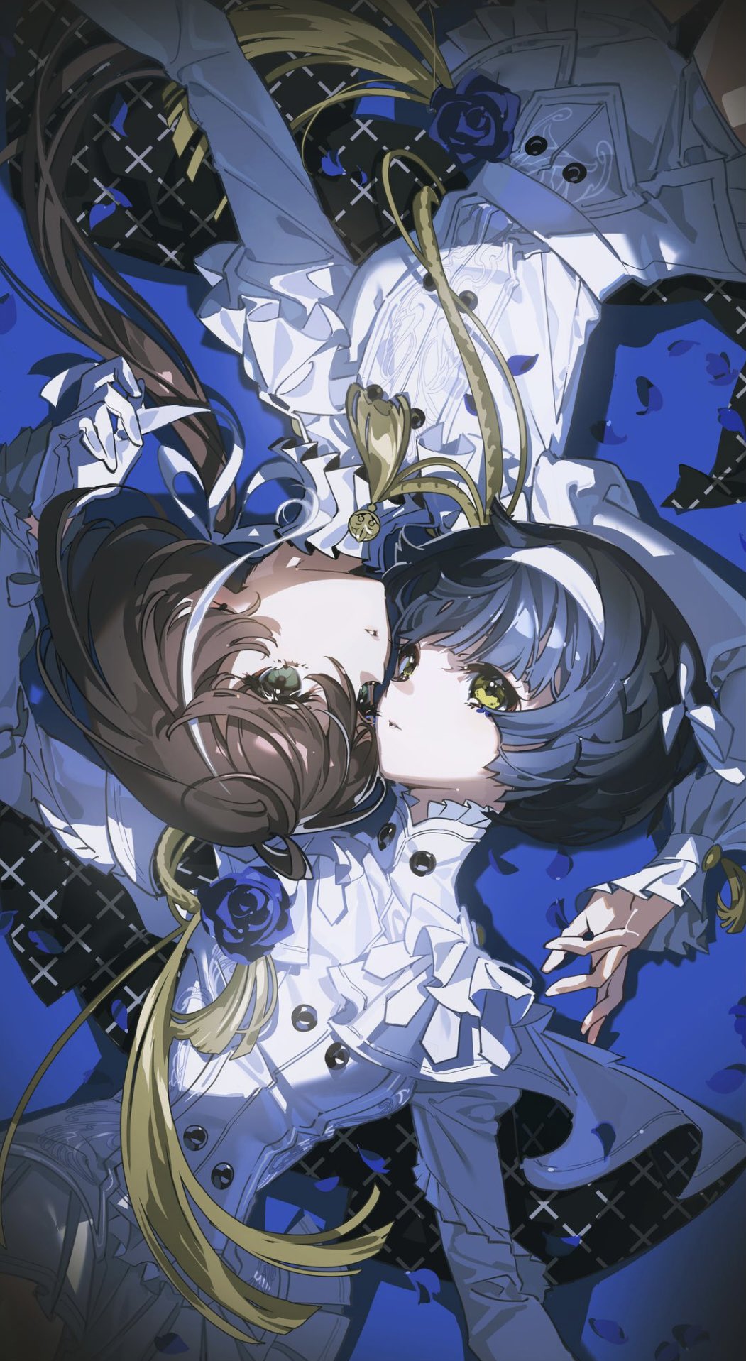 two anime girls are laying down, upside down, looking at each other.  both are wearing white dresses with blue accents, one has blonde hair and the other has brown hair. the girl with brown hair is on top of the girl with blonde hair.  a blue rose is on their shoulders and there are blue petals all around them.  the background is a dark blue crosshatch pattern.