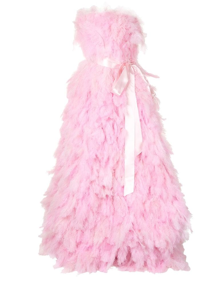 a strapless gown in a bright pink color is covered in fuzzy feathers. a shiny pink ribbon is wrapped around the top of the dress and tied into a bow in the front.