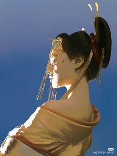 a woman with elaborate traditional japanese clothing and headdress is shown in profile against a blue background. the focus on her side profile emphasizes her elegance and the details of her attire.