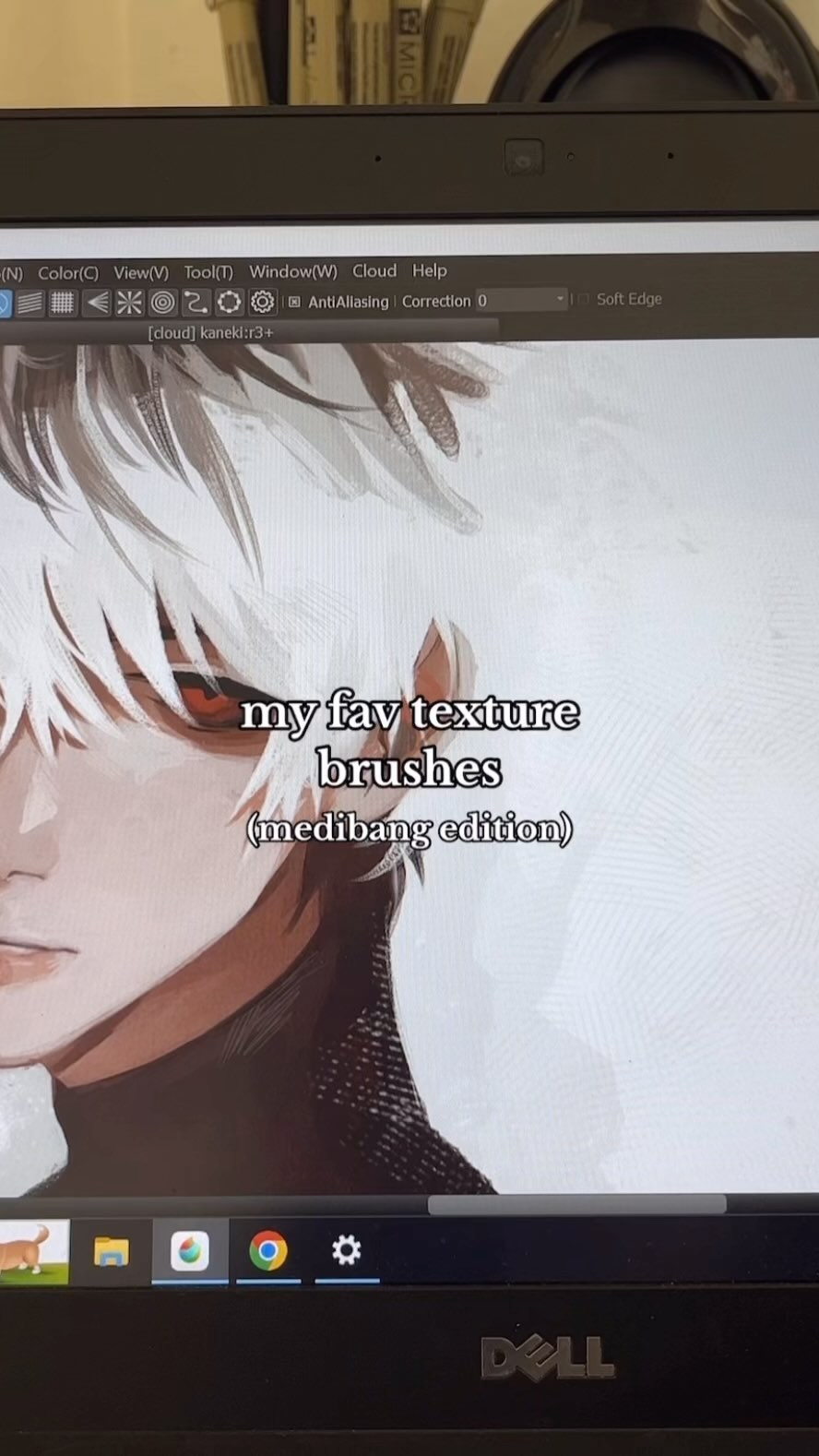 the image shows a laptop screen displaying digital artwork in progress. the artwork appears to be animestyle, focusing on a character's face with white hair and red eyes. a text overlay on the image states "my fav texture brushes (medibang edition)," indicating that the artist is showcasing favorite texture brushes used in the medibang paint pro digital art software. the top of the laptop screen displays the medibang paint pro menu bar. the overall image suggests a digital art tutorial or showcase.