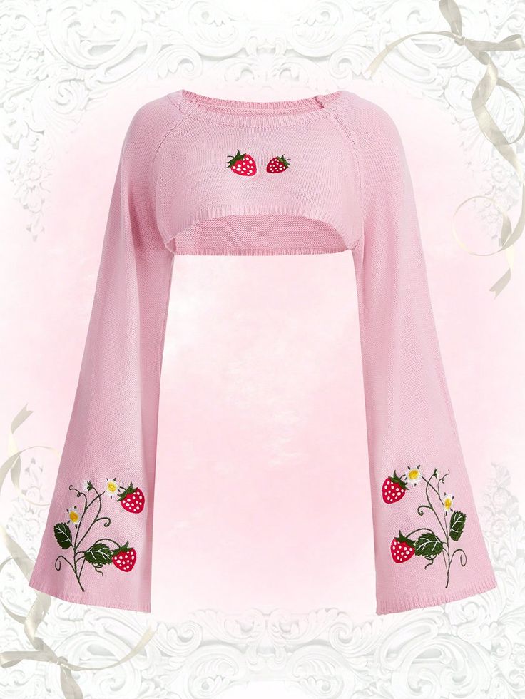 this is an image of a pink cropped sweater with long, bell sleeves. it has embroidered strawberries and flowers on the front and sleeves.