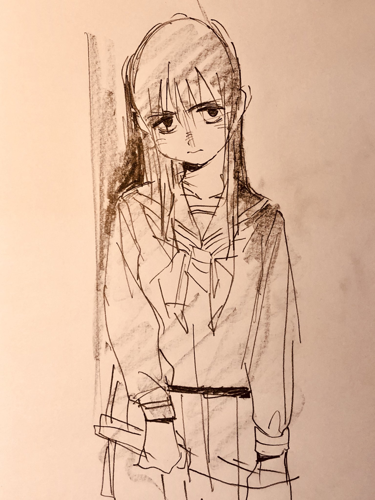 the image is a simple yet evocative sketch of a young girl in a japanese school uniform, likely a sailor fuku. she stands leaning against a wall, her expression suggesting sadness or loneliness. the drawing style is loose and expressive, using hatching and crosshatching to create depth and shading. the overall tone of the image is somber and melancholic.