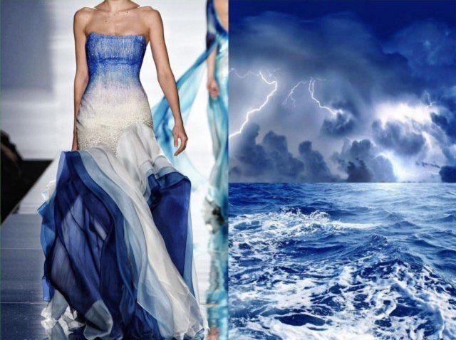 a woman in a blue and white dress is standing on a runway. the dress is flowing and elegant, and it looks like it's made of silk or satin. the woman is wearing her hair up, and she has a natural makeup look. she is looking straight ahead. the background is a storm at sea. the sky is dark and stormy, and the waves are crashing. the contrast between the woman's beauty and the storm is striking. the image is a visual representation of the power of nature and the beauty of human creation.