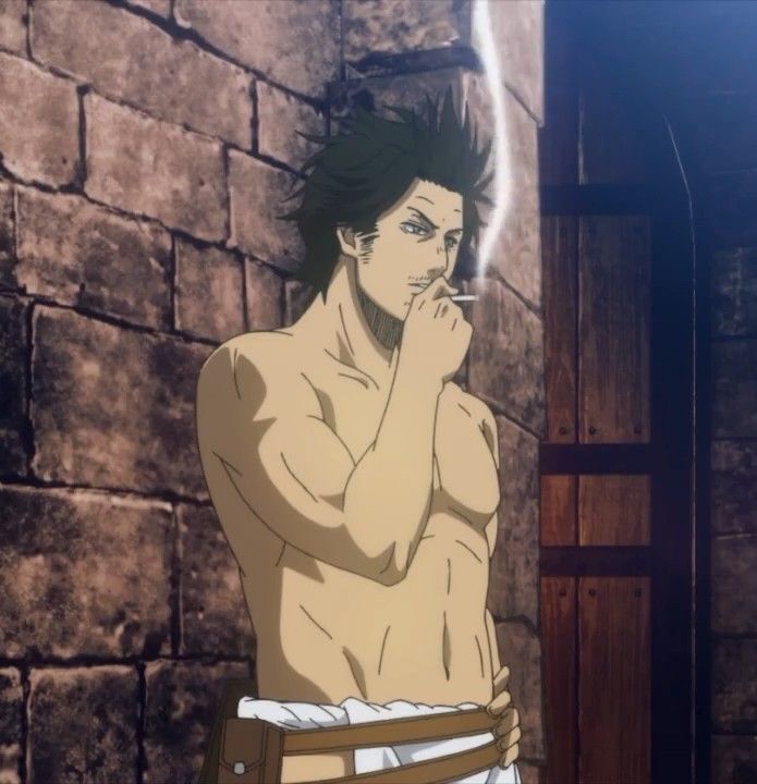 this is an anime image from black clover, of a character named yami. he is a muscular male with dark hair and a serious expression. yami is shirtless, with a dark waistband around his hips, and is smoking a cigarette.  he stands between a stone wall and a wooden door.