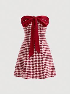 a red and white houndstooth mini dress with a strapless halter top and a big red bow. the dress is perfect for a summer cocktail party.