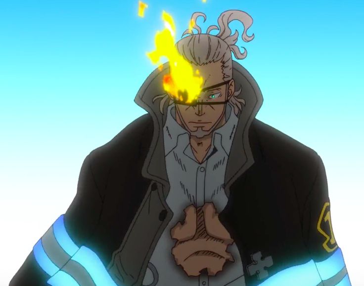 a man with blonde hair and green eyes is standing in front of a light blue background. he is wearing a black coat with blue and silver stripes on his left sleeve.  the man has a fire that is covering his right eye and seems to be causing him pain, as his expression is one of annoyance.  he appears to be a fire soldier from the fire force manga.