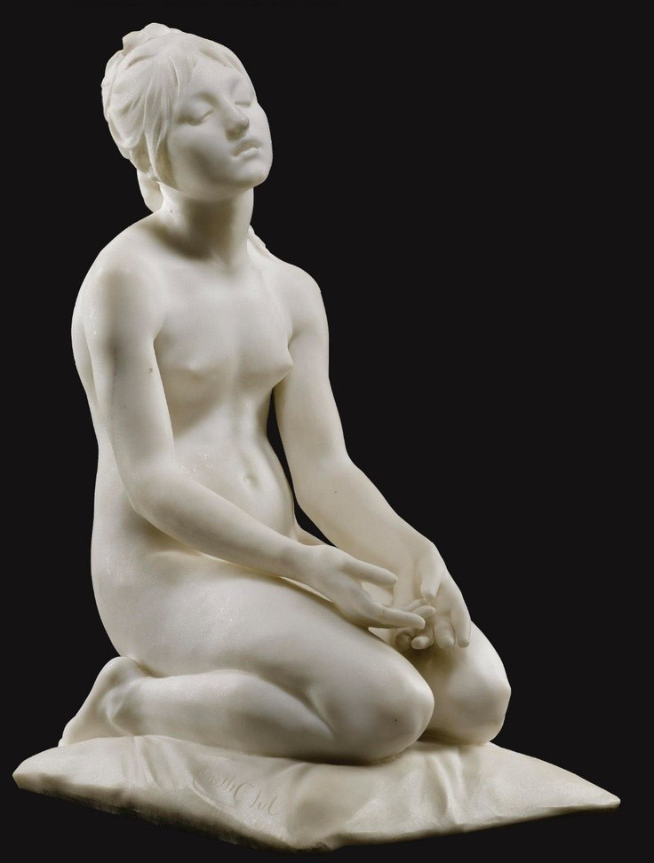 a white marble sculpture of a nude woman kneeling with her eyes closed. she is praying, with her hands clasped together. the sculpture is set against a black background, which highlights the details of the woman's body and the beauty of the marble. the sculpture is in a classical style, reminiscent of renaissance art.