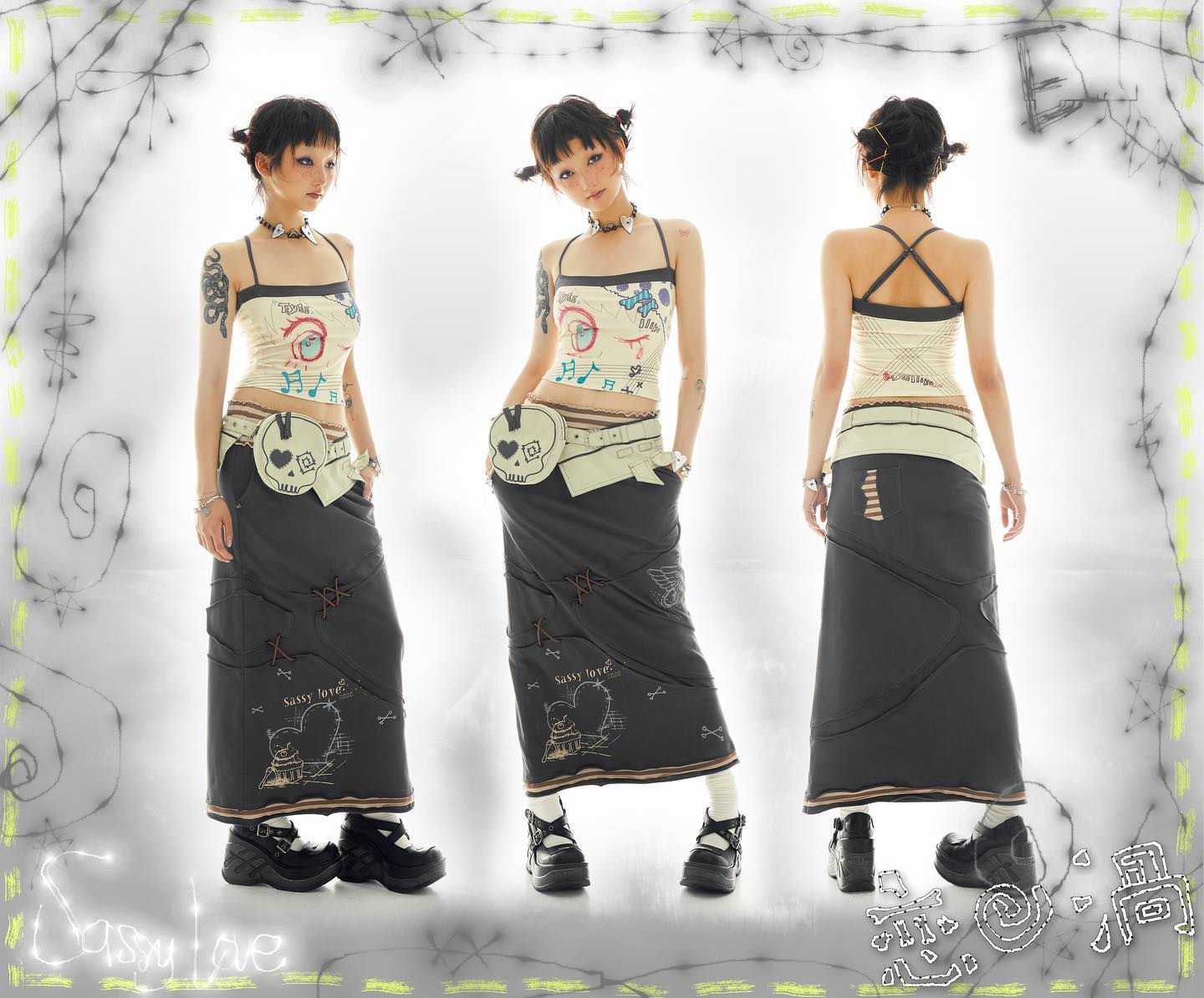 the image showcases a fashion model wearing a complete outfit from the brand "sassy love." the outfit consists of a beige graphic tank top and a dark grey maxi skirt with unique detailing, including skull and heart graphics. the model is shown from three different angles – front, side, and back – to fully display the clothing.  the background is minimalist white with a stylized graphic border reminiscent of barbed wire and doodles. the model's hair is styled in short, edgy cuts and her overall look reflects a grunge/alternative aesthetic. the image is a fashion editorialstyle shot, likely for online or print promotion of the clothing line.