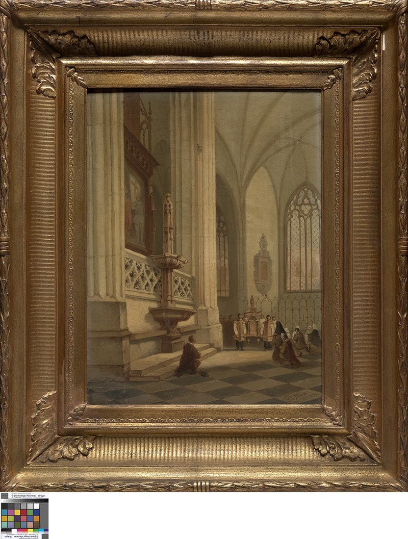 the painting shows the interior of a gothic church, featuring towering columns, arched ceilings, and stained glass windows. a group of people are gathered, some kneeling in prayer on a checkered floor, while others stand in robes near an altar. the artwork is displayed in an ornate golden frame.