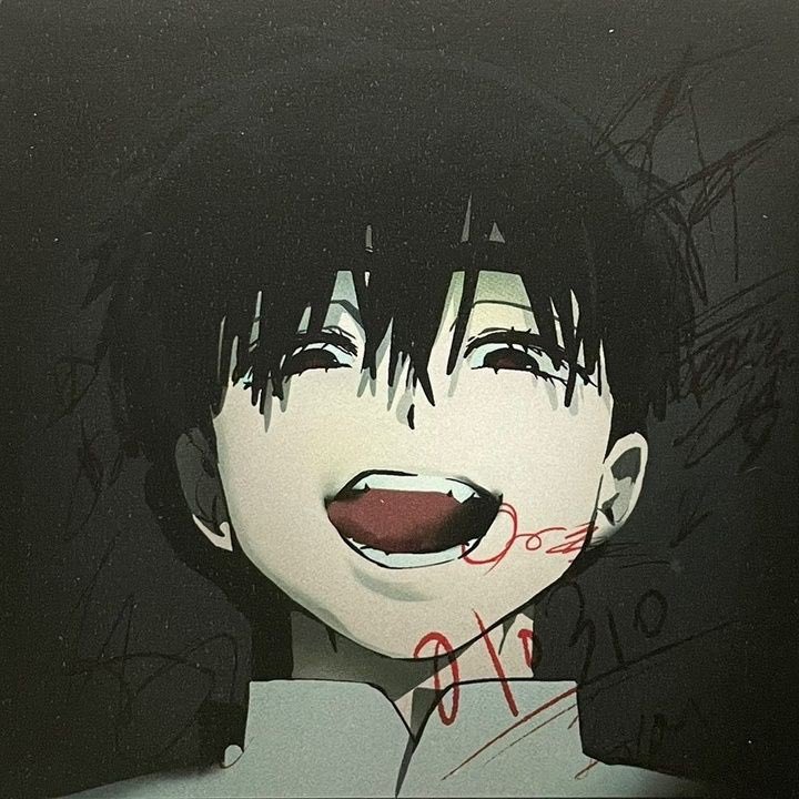 the image is a closeup portrait of an anime character, a boy with black hair and white skin. he is smiling, but the smile is unsettling and creepy. his eyes are wide and staring, and there are red lines on his face and neck. the background is black, which adds to the sense of darkness and unease. the overall image is quite unsettling and disturbing, and it's likely a character from a horror anime or manga series.