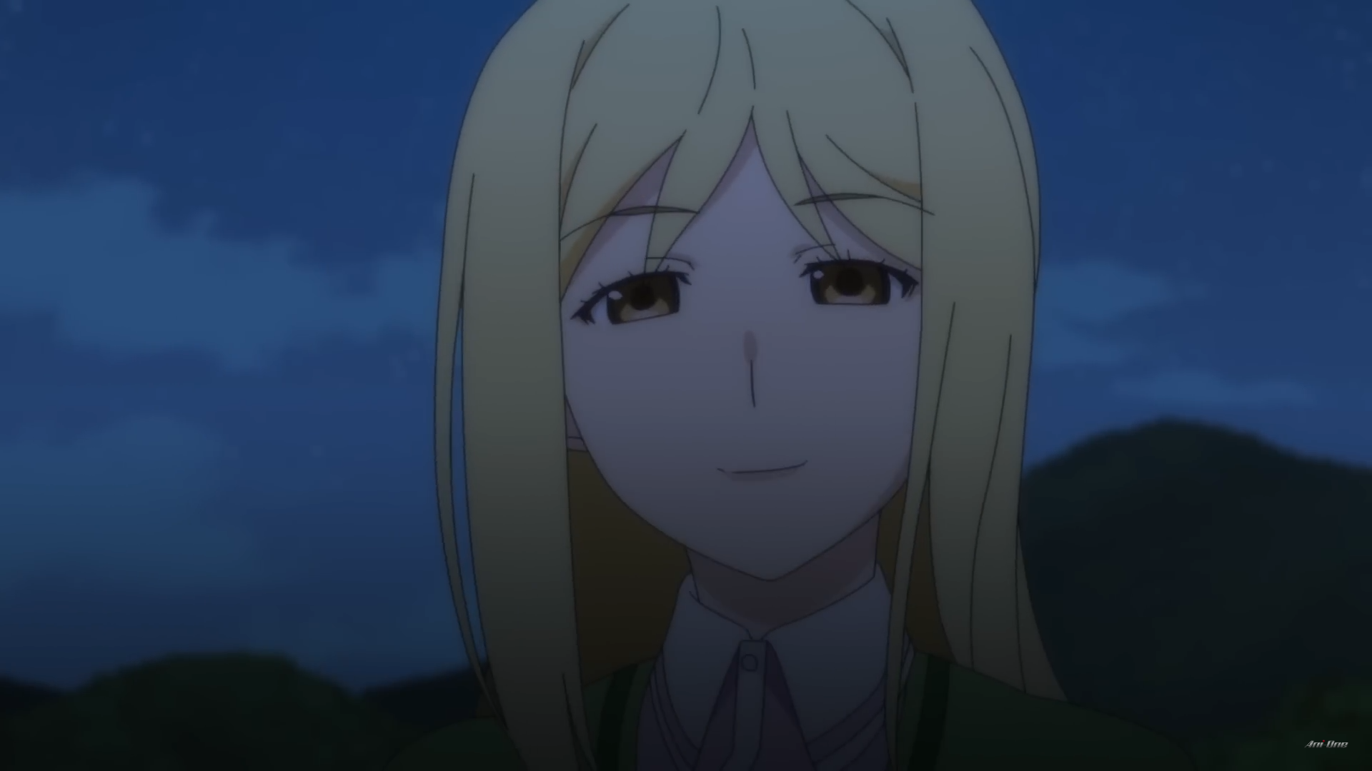 a closeup of an anime girl with blonde hair and brown eyes smiling softly.  she is wearing what appears to be a school uniform.  she has a green blazer and a pink and white shirt underneath. the background is dark, likely set at night time, with a dark blue sky and the outline of a hill.  the lighting is soft.