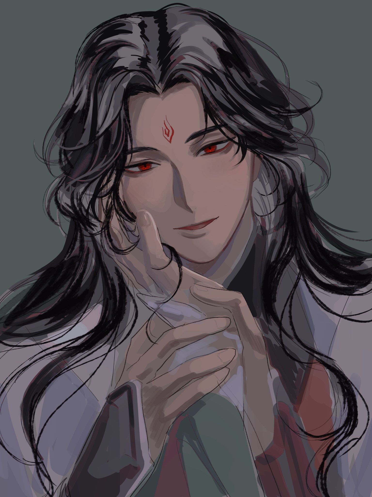 a drawing of an anime man with long black hair, red eyes and a red mark on his forehead. he is wearing white, green and red clothes and has a smile on his face. he is holding his hands up to his face and his fingers are touching his cheek. the background is a gray color.