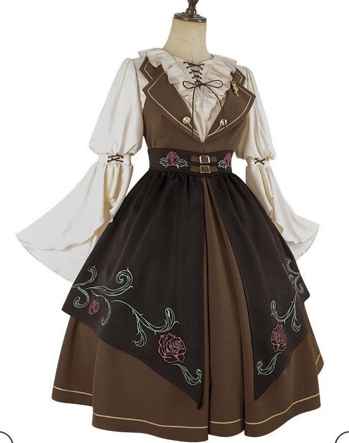 a mannequin dressed in a brown and cream lolita fashion dress stands against a white background. the dress is richly detailed with embroidery, ruffles, and a layered skirt. the lighting is bright and even, highlighting the textures and colors of the garment.