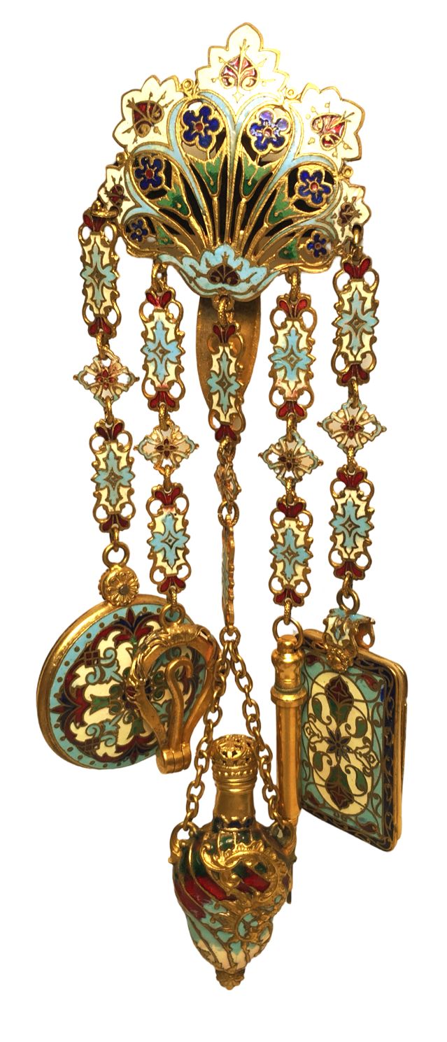 a closeup shot of an ornate piece of antique jewelry, likely a brooch or pendant, featuring gold metalwork and colorful enamel detailing. it includes a floral design at the top and a series of chains that lead to various decorative elements, including a round locket, a horseshaped pendant, a perfume bottle, and a rectangular boxlike component. the piece appears to be from the art nouveau era due to its intricate and natureinspired design.